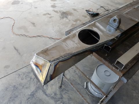 1978 Ford Bronco - Custom metal bumper fabrication in progress, showing welding and a tow hook mount.
