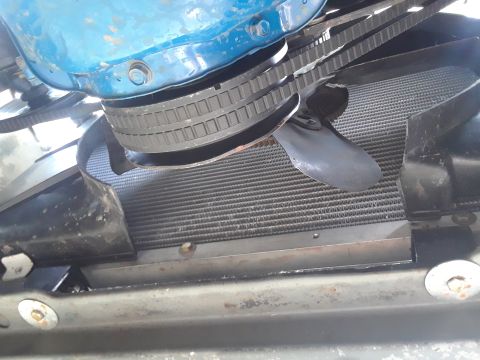 1985 Ford Bronco - Close-up view of an engine's fan and radiator assembly.
