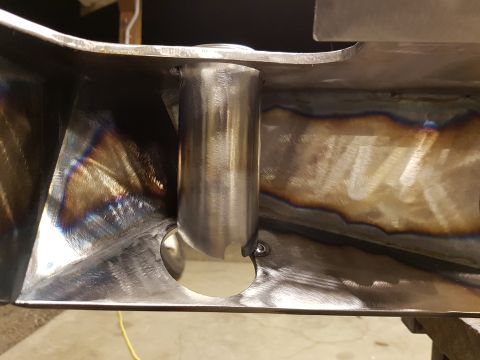 1978 Ford Bronco - Welded metal frame part with a cylindrical protrusion, showing signs of fabrication.