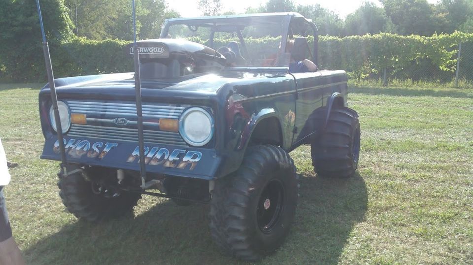 1978 Ford Bronco with 'Ghost Rider' painted on the front and a large air scoop on the hood