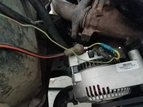 1985 Ford Bronco - Close-up of alternator wiring, showing connections and part number label.