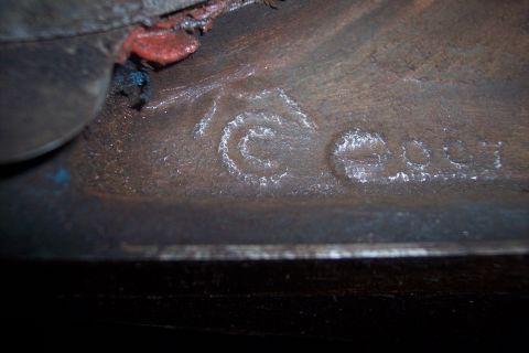 1978 Ford Bronco - Cast metal part shows a circular symbol and the numbers 'C 904'.