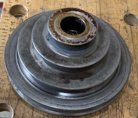 2002 Ford Ranger - A multi-groove pulley is shown on a workbench, with a Supermotors.net watermark visible.