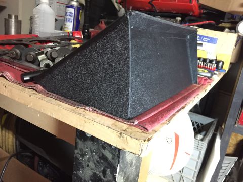 2000 Lotus Esprit - Workbench with tools and a black textured box. The box is on a red cloth.