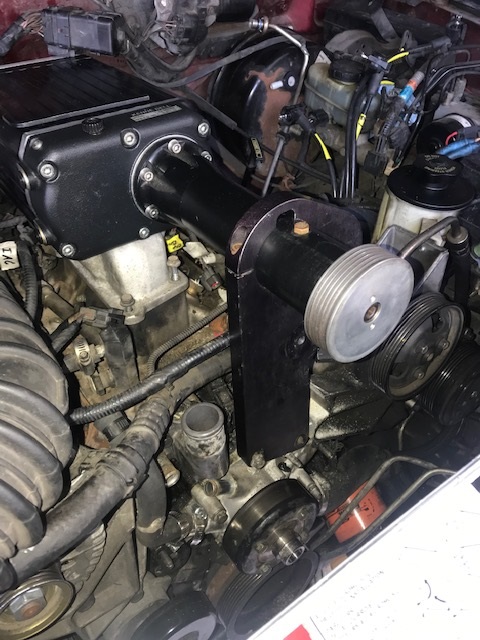 2000 Ford Explorer - Engine bay view of a supercharger installation.