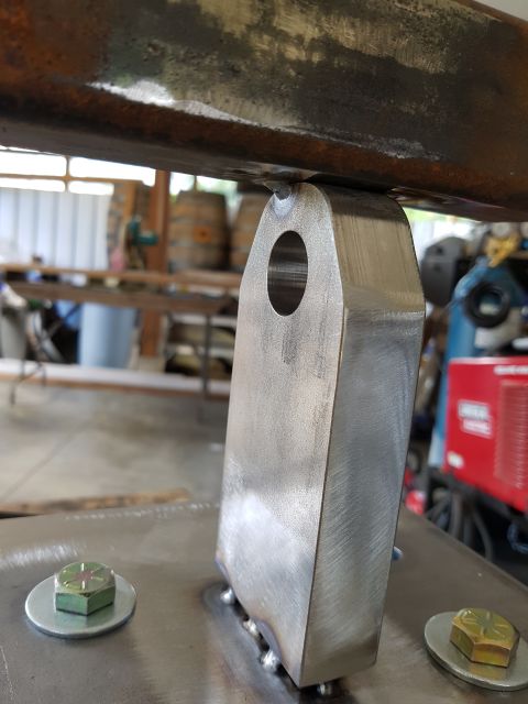 1978 Ford Bronco - Close-up of a custom metal bracket, likely for a vehicle modification project.