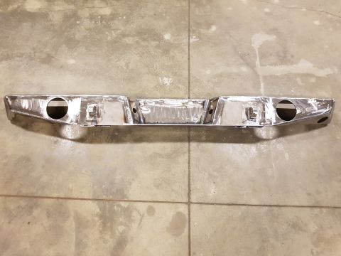 1978 Ford Bronco - A custom-fabricated rear bumper, likely for an off-road vehicle, is shown before installation.