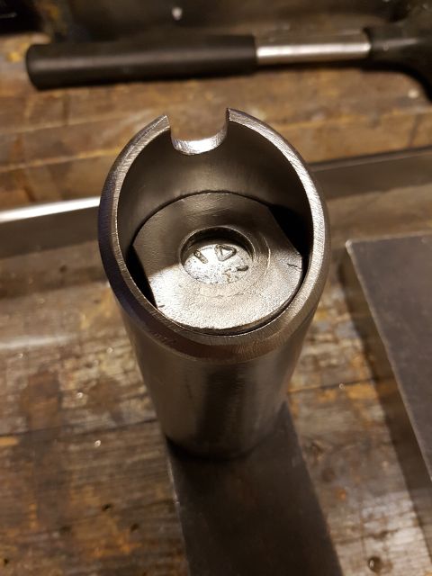 1978 Ford Bronco - Metal tool with a bolt secured inside, Supermotors.net logo visible.
