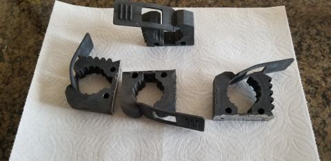 1996 Ford Bronco - Set of four tool holder clips, likely for organizing garage or workshop tools.