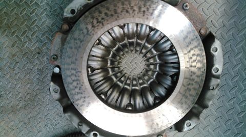 2017 Ford Mustang - Close-up of a vehicle clutch assembly, likely a pressure plate and disc.