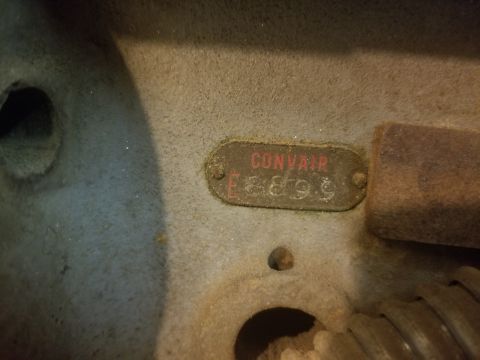 1978 Ford Bronco - Close-up of an engine component a metal identification tag with the text CONVAIR E8899.