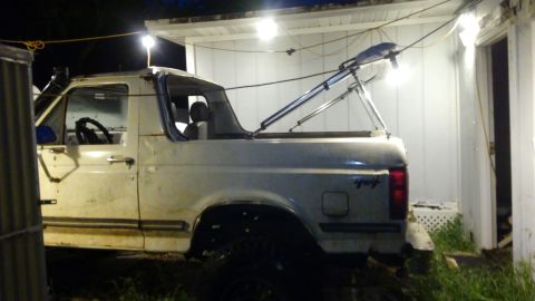 1988 Ford Bronco - because i got a bomini with rods in the back instead of straps, it can also fold back and has a cover to protect it while stored. should be…