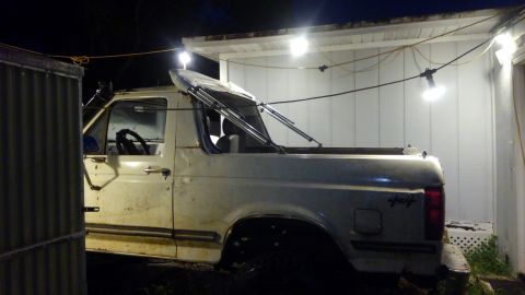 1988 Ford Bronco - it can also be folded forwards by removing the rear rods. the whole thing is only held on by 4 wing nuts and 2 straps so it can be removed…