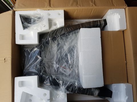 1978 Ford Bronco - A vehicle part is shown packed in foam and plastic within a shipping box, with a SuperMotors.net watermark visible.
