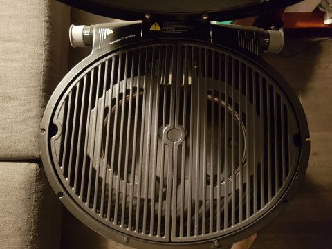 1978 Ford Bronco - Close-up view of a grill's cooking surface and warning labels.
