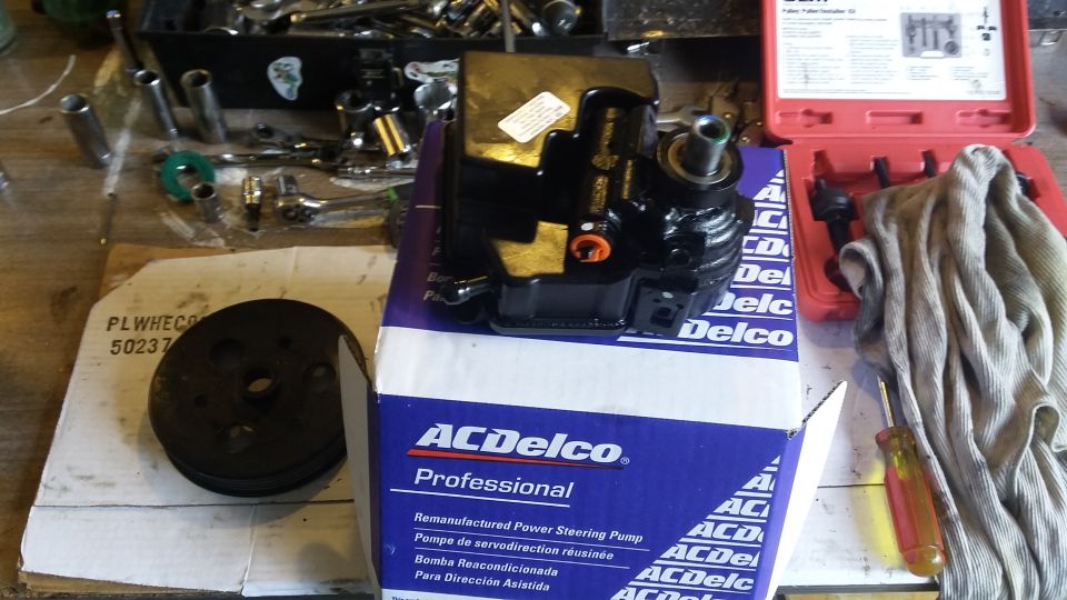 ACDelco remanufactured power steering pump on box, with pulley and tools