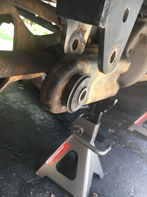 1996 Ford Bronco - Vehicle suspension part shown on jack stands, likely during maintenance or repair.