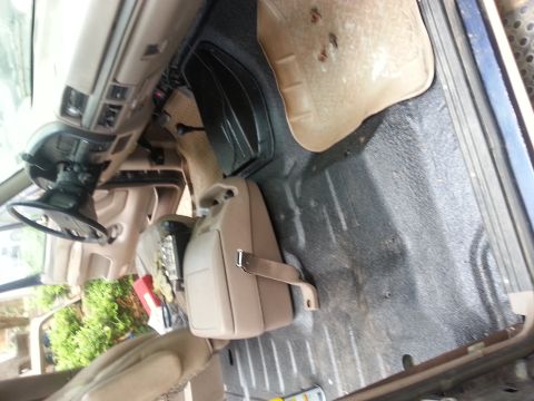 1995 Ford Bronco - Interior view of a 1995 Ford Bronco, including the dashboard and seating areas.
