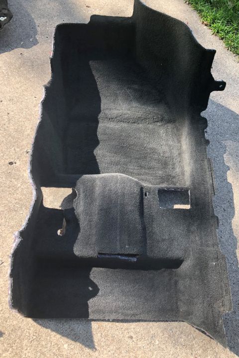 2015 Ford Explorer - This is a removed car carpet, not a 2015 Ford Explorer.