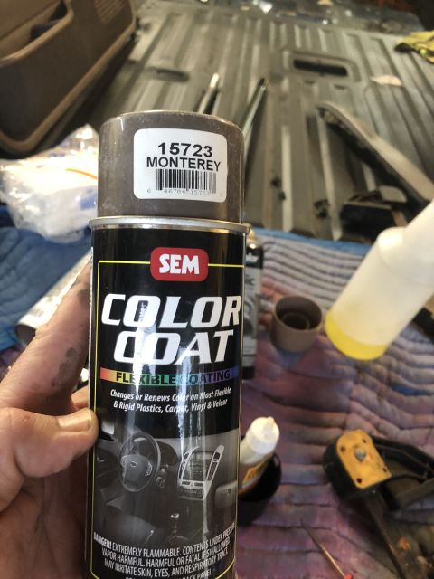 1995 Ford Bronco - A can of SEM Color Coat flexible coating in Monterey color is shown, with the interior of a vehicle in the background.