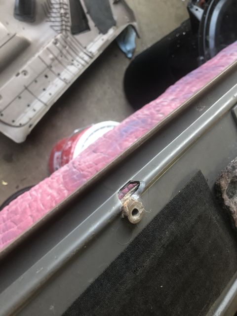 1995 Ford Bronco - Interior trim piece shows damage and exposed wiring, with pink insulation visible.