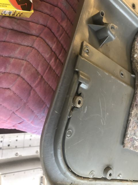 1995 Ford Bronco - This photo shows the interior door panel hardware and insulation of a vehicle.