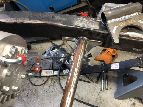 1992 Jeep Wrangler - Custom metal fabrication work on a vehicle frame, possibly for an off-road build.