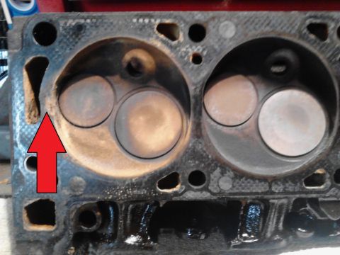 1978 Ford Bronco - This image shows a damaged engine cylinder head, not a 1978 Ford Bronco.