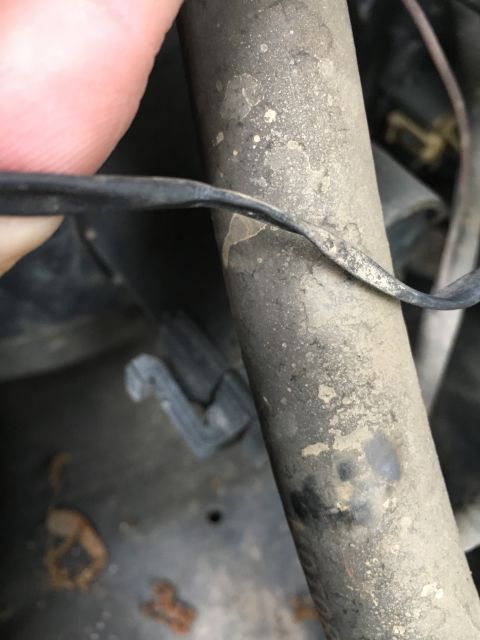 1996 Ford Bronco - A close-up view shows a dirty hose and wire, with a Supermotors.net watermark visible.