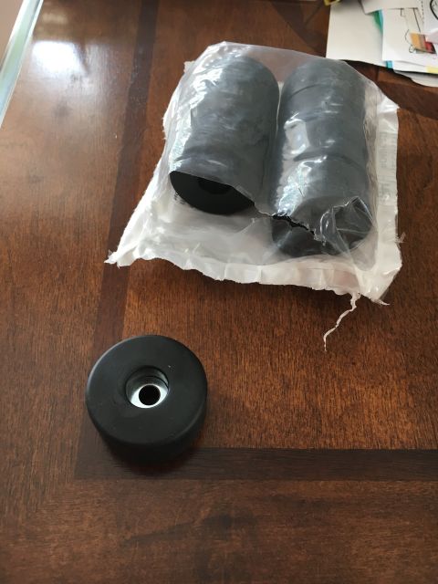 1996 Ford Bronco - These are rubber bump stops, likely for a vehicle suspension system.