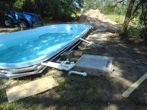 1992 Ford Bronco - Swimming pool installation in progress, with a tractor visible in the background.