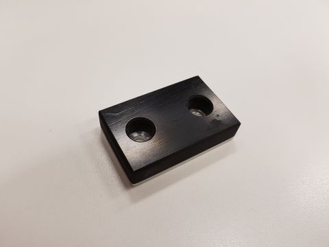 1978 Ford Bronco - A black metal part with two holes is shown against a white background, with a website URL at the bottom right.