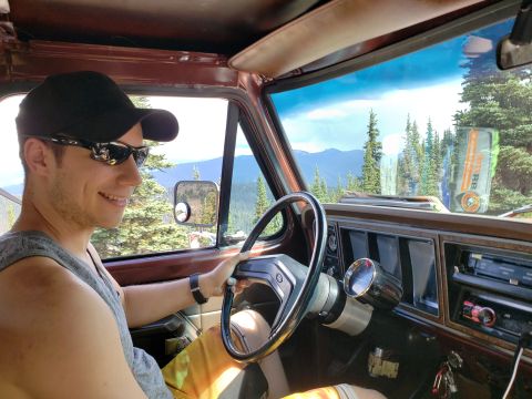 1978 Ford Bronco - Driving a 1978 Ford Bronco through a scenic mountain landscape.
