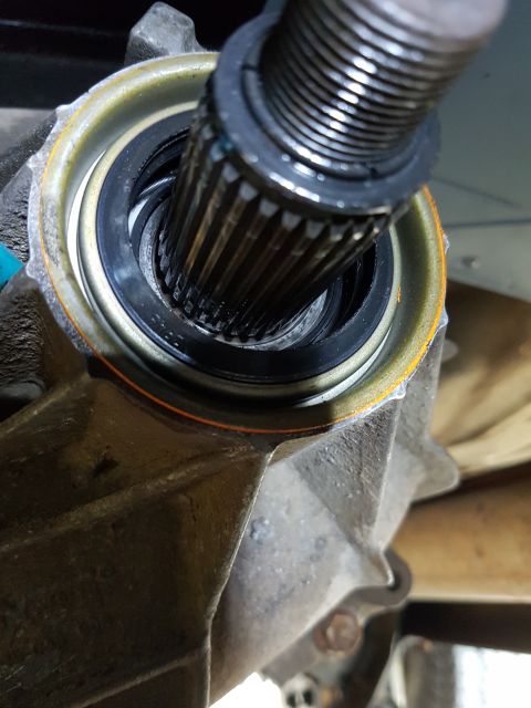 1978 Ford Bronco - Close-up view of a splined shaft and seal within a vehicle component.