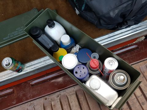 1978 Ford Bronco - Ammo can filled with various supplies and an open beer can are visible in the cargo area.