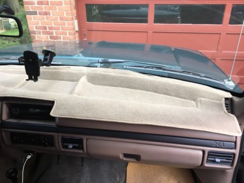 1996 Ford Bronco - Interior view of a 1996 Ford Bronco, showing the dashboard with an XL badge and air vents.