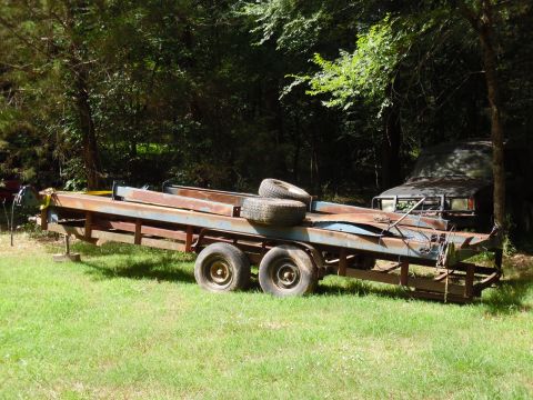 2004 Land Rover Land Rover - After I bought some property, I loaded the lift onto the trailer & hauled them away.