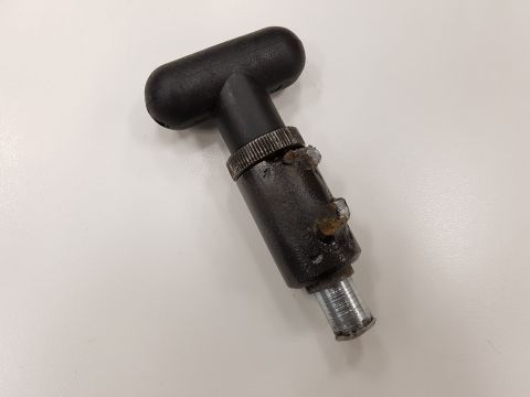 1978 Ford Bronco - A black T-handle part with a metal shaft and knurled collar is shown against a white background.