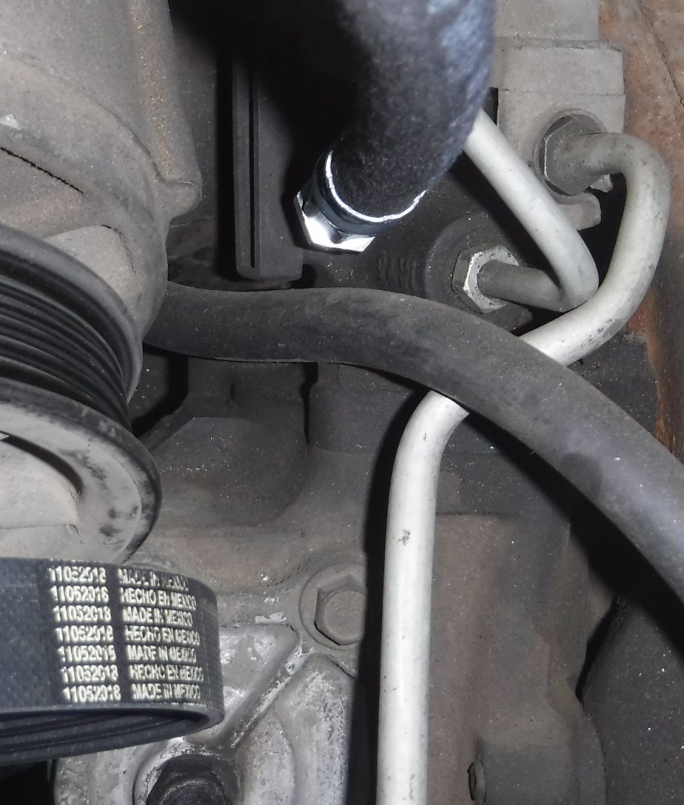 4-bolt steering box hose (high pressure supply side) discrepancy.  5/8" Russell 648030 (for Saginaw swap) held on the left, 5/16" Carquest 35285 currently installed (stock pump) on the right.  Doesn't seem like that'll fit...
