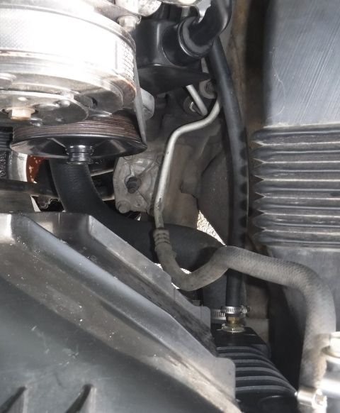 1992 Ford Bronco - With the offset Saginaw reservoir, the return hose from the radiator's tranny cooler (I used it for the PS cooler, since I added an externa…