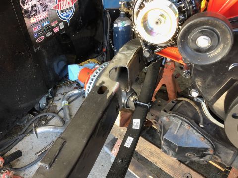 1992 Jeep Wrangler - A close-up view of a vehicle's chassis and engine components, likely during a modification or repair process. Visible parts include a leaf…