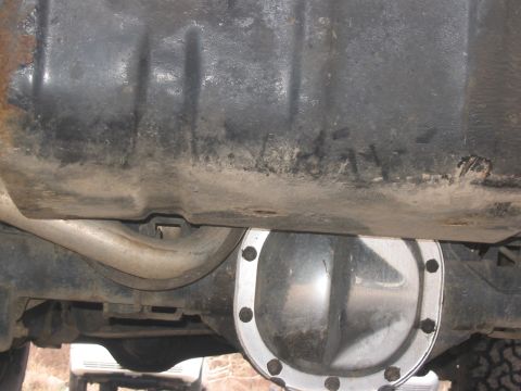 1989 Ford Bronco - Chrome cover on the rear pumpkin, gas tanks kinda in the way