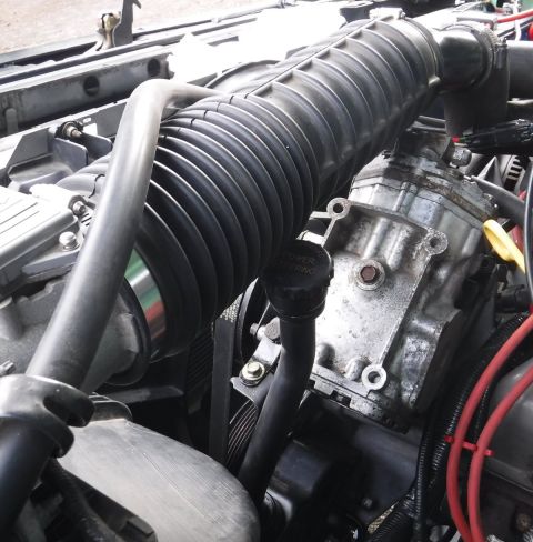 1992 Ford Bronco - Oops, so much for loads of clearance (as positioned). The Saginaw long neck reservoir doesn't fit so great once the intake tube is back in…