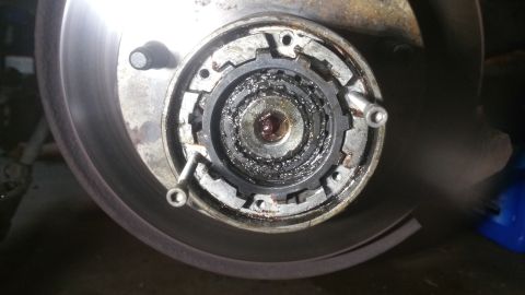 1996 Ford Bronco - This is a close-up view of a vehicle's front wheel hub assembly, showing its internal components.