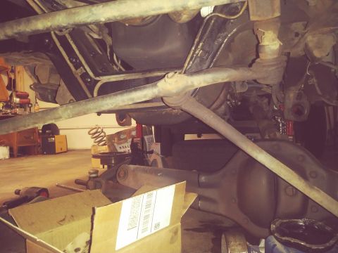 1996 Ford Bronco - Close-up view of the front suspension and differential assembly of a 1996 Ford Bronco.