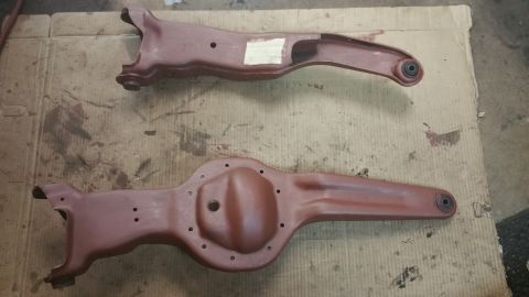 1996 Ford Bronco - Two automotive suspension components are shown, likely for a vehicle's front and rear.