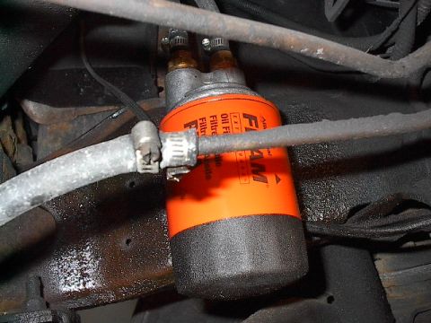 1986 Ford Bronco - Drilled and tapped right into passenger's frame rail. Note charcoal canister upper left.