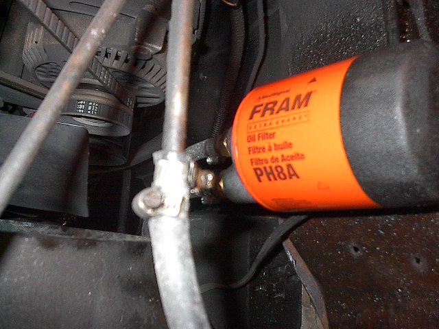 Shroud at the bottom, then fan blade, then 1995 mustang 130 amp alternator.  Know where you are yet ?