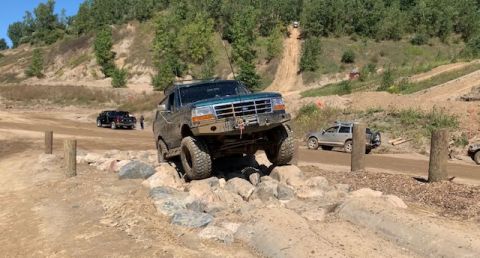 1996 Ford Bronco - This 1996 Ford Bronco is tackling a challenging off-road obstacle course.