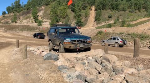 1996 Ford Bronco - This 1996 Ford Bronco is shown tackling a challenging off-road trail.